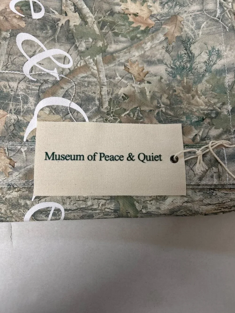 MUSEUM OF PEACE AND QUIET Wordmark Camo Tote Bag Camouflage Size One Size NWT